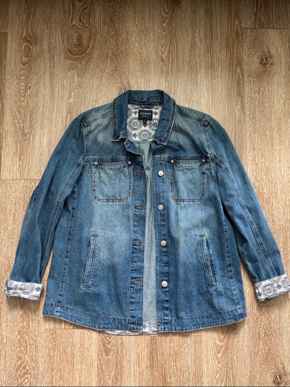 Curve Appeal medium wash denim shirt jacket, paisley/floral trim, large